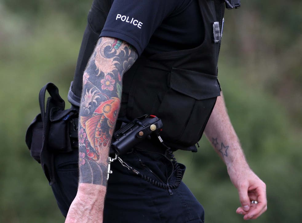 Officers for West Yorkshire Police were allowed to show 'small and inoffensive' tattoos on their neck and hands but not on their arms