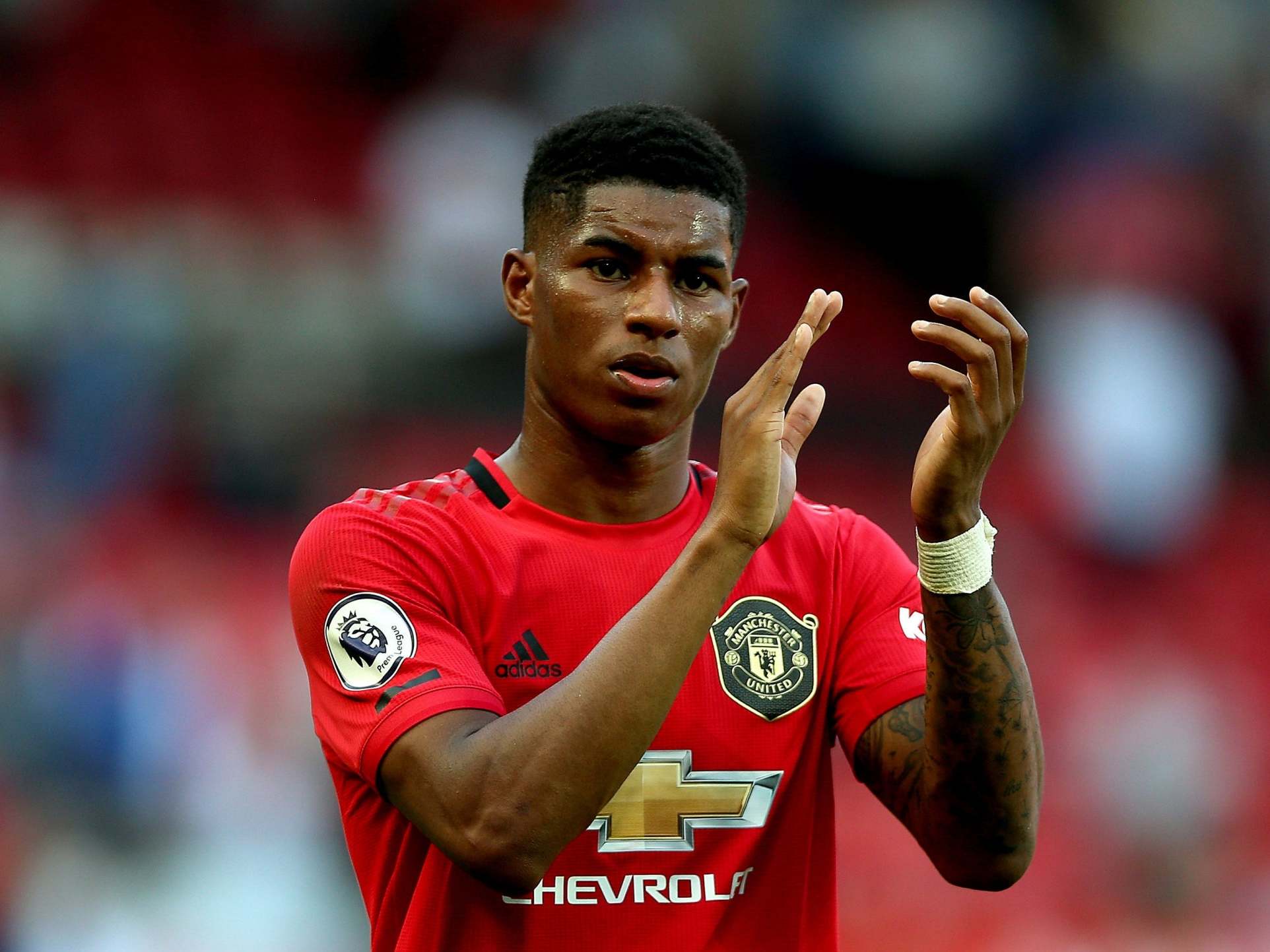 Rashford applauds the fans after United suffer defeat to Palace