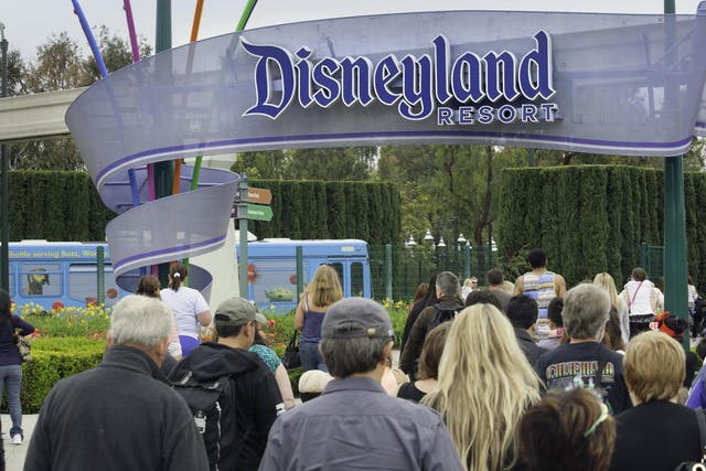 A large group of people entering the Disneyland Resort in Anaheim, where Disneyland Park and Disney California Adventure Park are located
