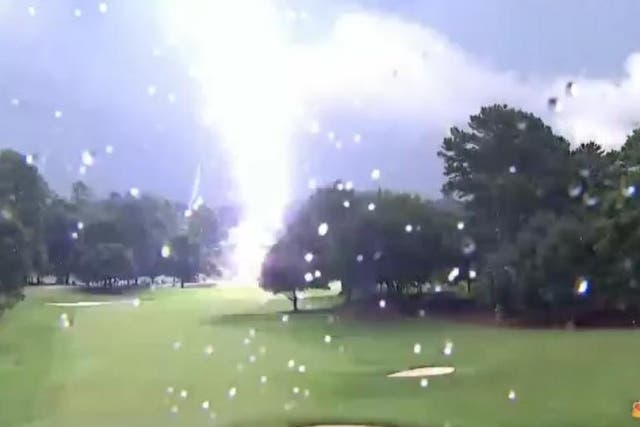 Lightning strikes near the 15th green at the Tour Championship