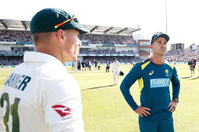 Justin Langer appears dejected after suffering defeat