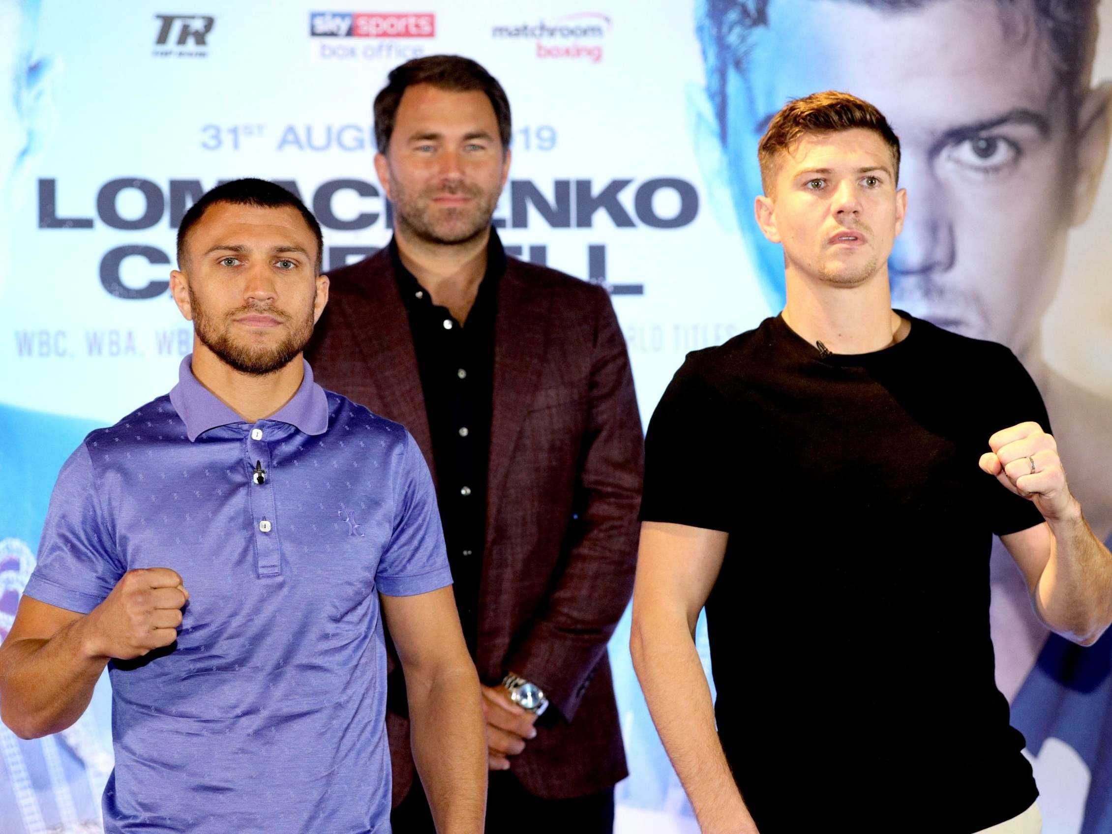 Lomachenko and Campbell pose with promoter Hearn