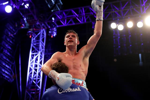 Luke Campbell is picked up in celebration by trainer Shane McGuigan