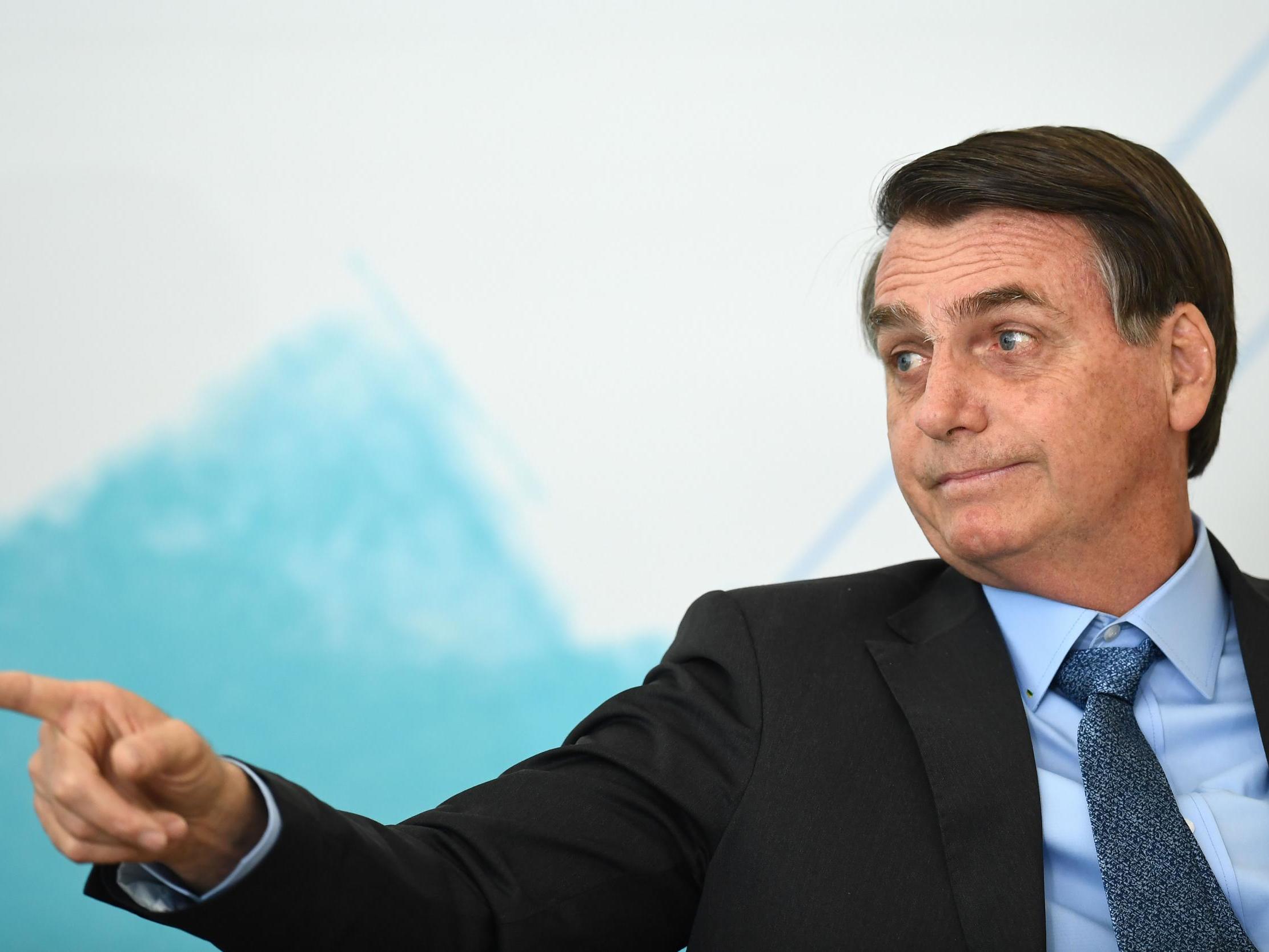 Jair Bolsonaro has rejected worldwide offers of aid to abate the fires as 'colonialism' (AFP/Getty Images)