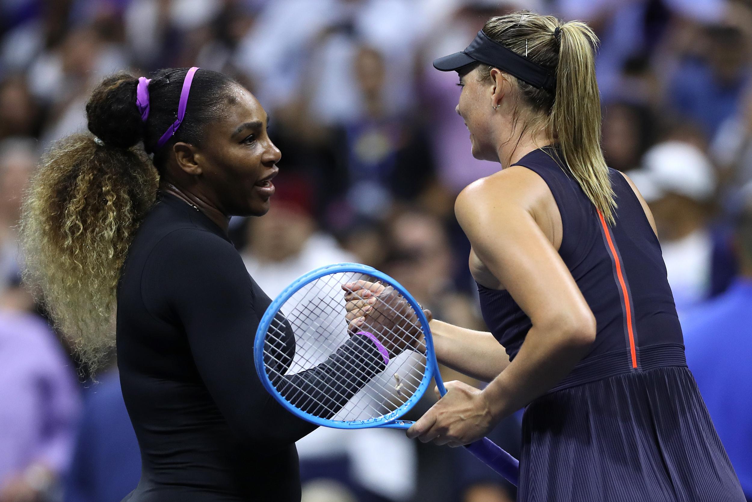 Serena Williams and Maria Sharapova shake hands following their first round match at the 2019 US Open