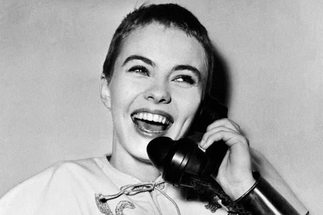 Jean Seberg on a phone call during the filming of ‘Joan of Arc’, directed by Otto Preminger, in 1957, in London