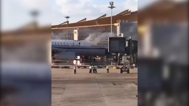 An Air China plane caught fire at Beijing airport