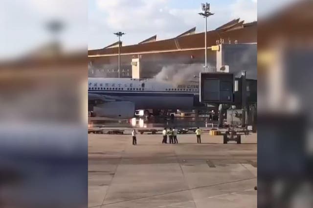 An Air China plane caught fire at Beijing airport