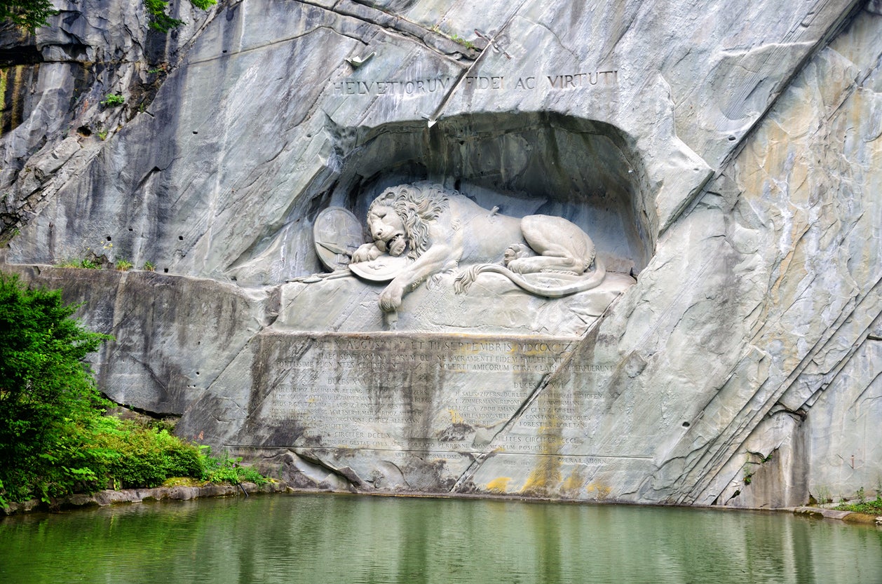 ‘The Dying Lion of Lucerne’ is a memorial to Swiss soldiers who died in the French Revolution (Getty/iStockphoto)