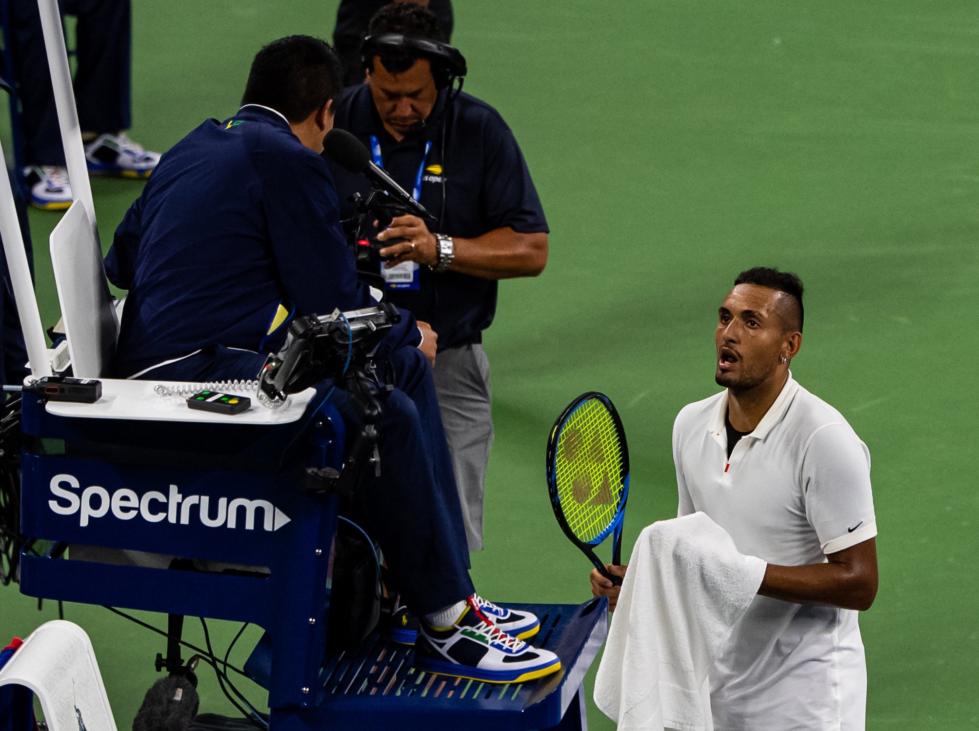 Nick Kyrgios in discussion with umpire, James Keothavong