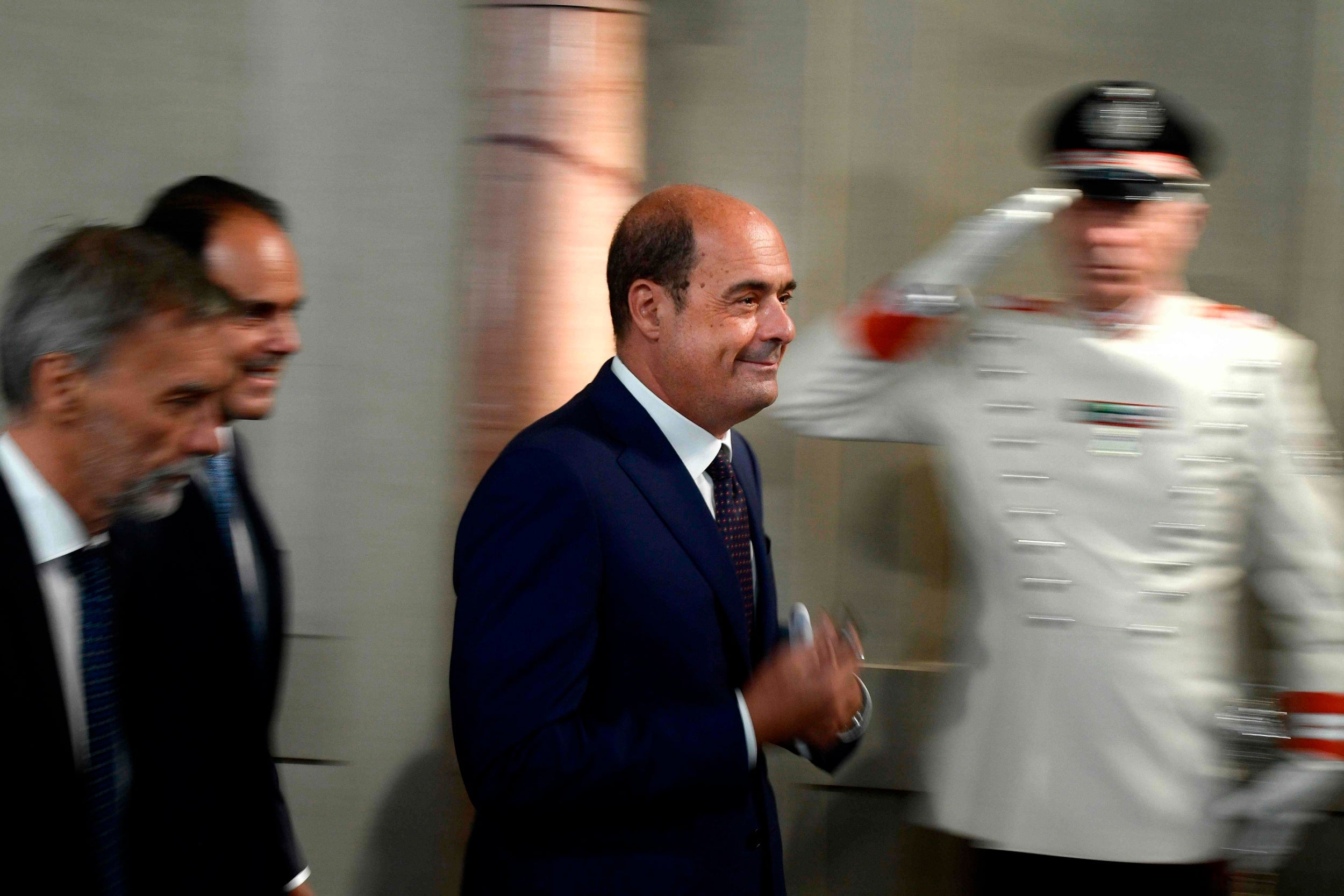 Italian Democratic Party leader Nicola Zingaretti leaves following a meeting with the Italian president