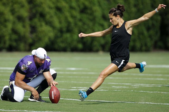 Carli Lloyd in practice with the Baltimore Ravens