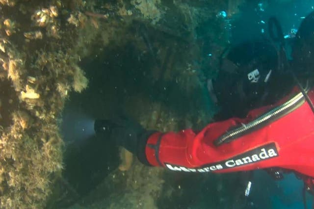 A diver peers into Captain Crozier’s cabin