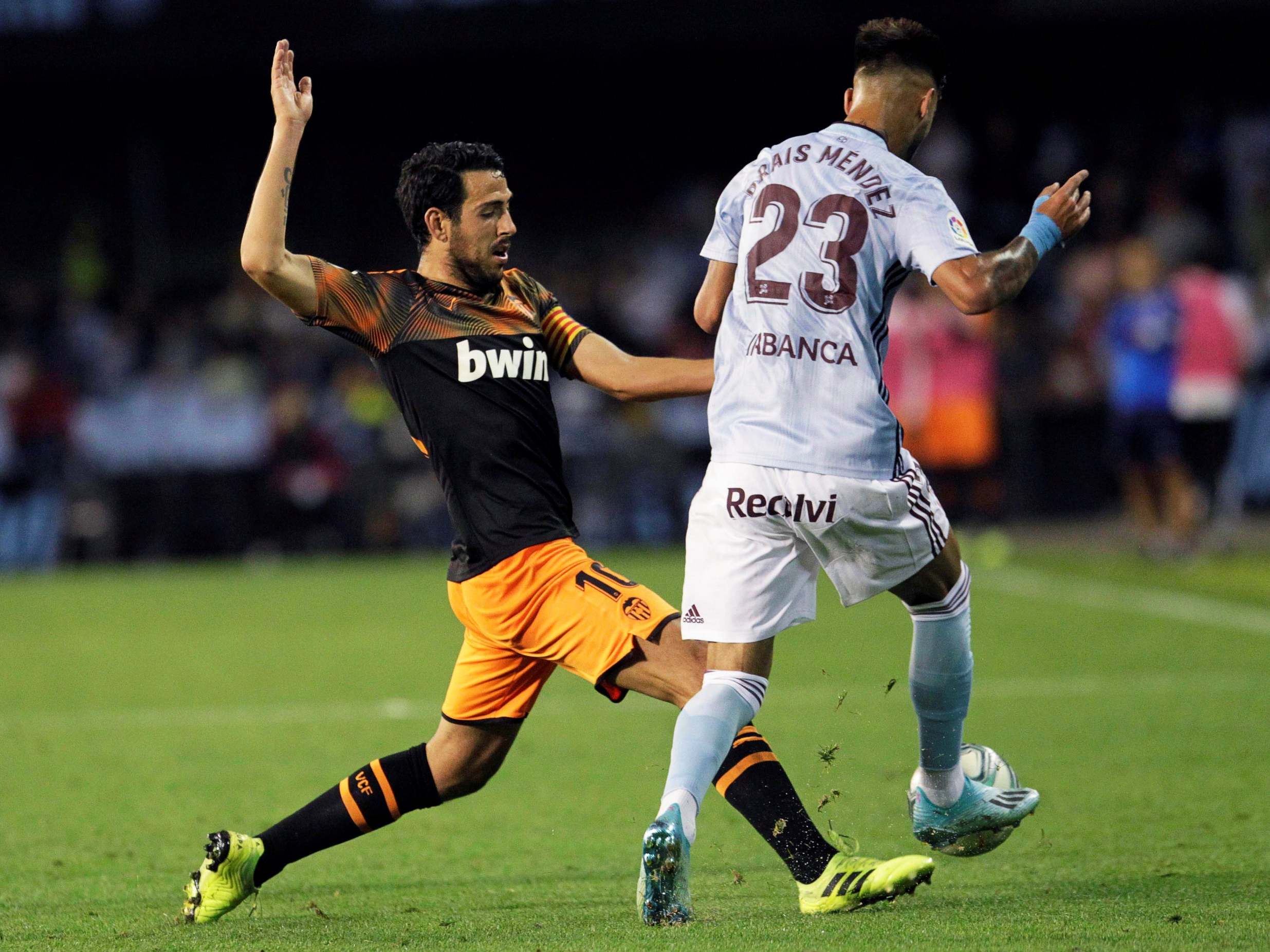 Dani Parejo wins the ball back for Valencia