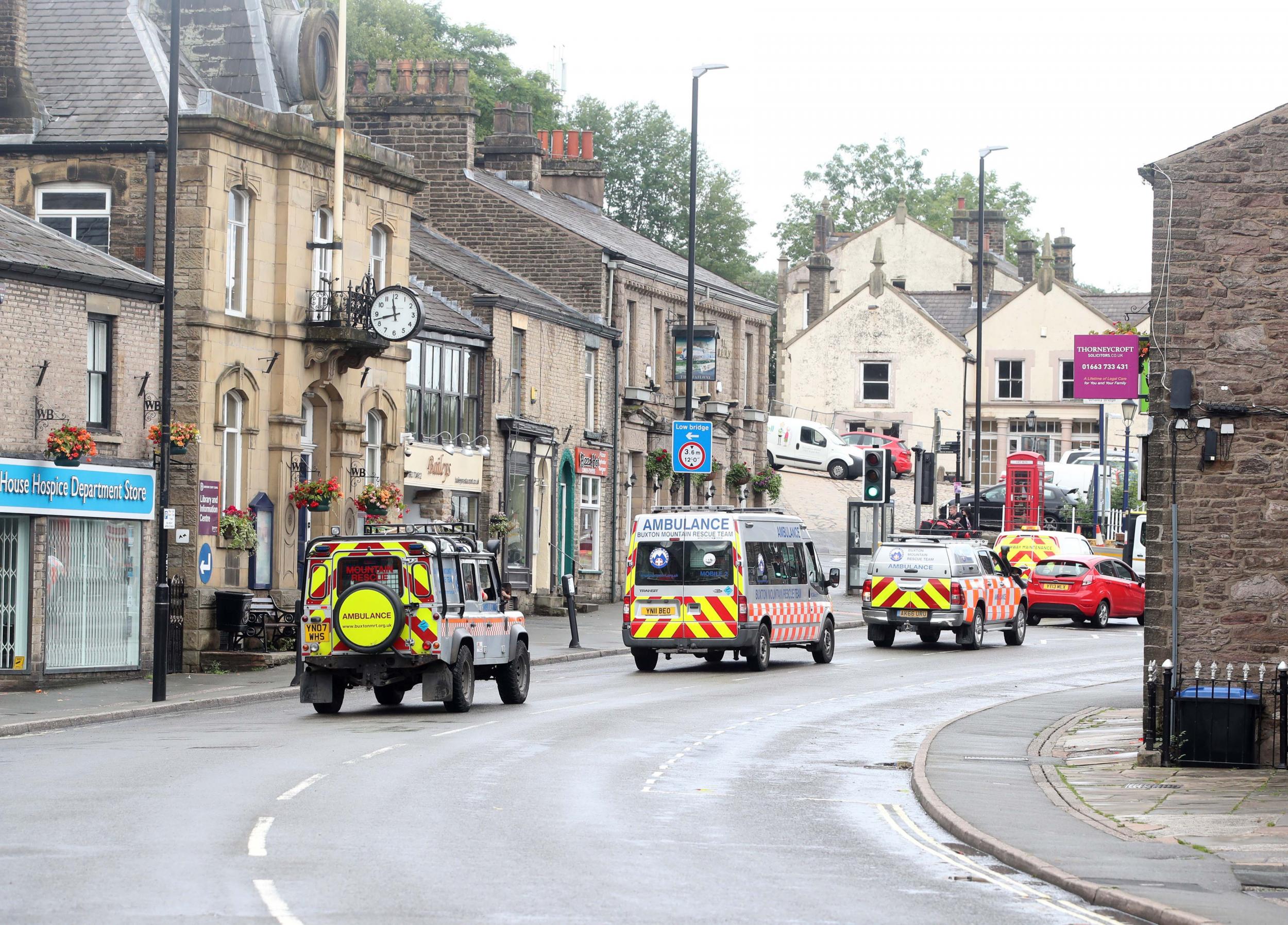 Emergency services in the village of Whaley Bridge after Toddbrook Reservoir was damaged in heavy rainfall