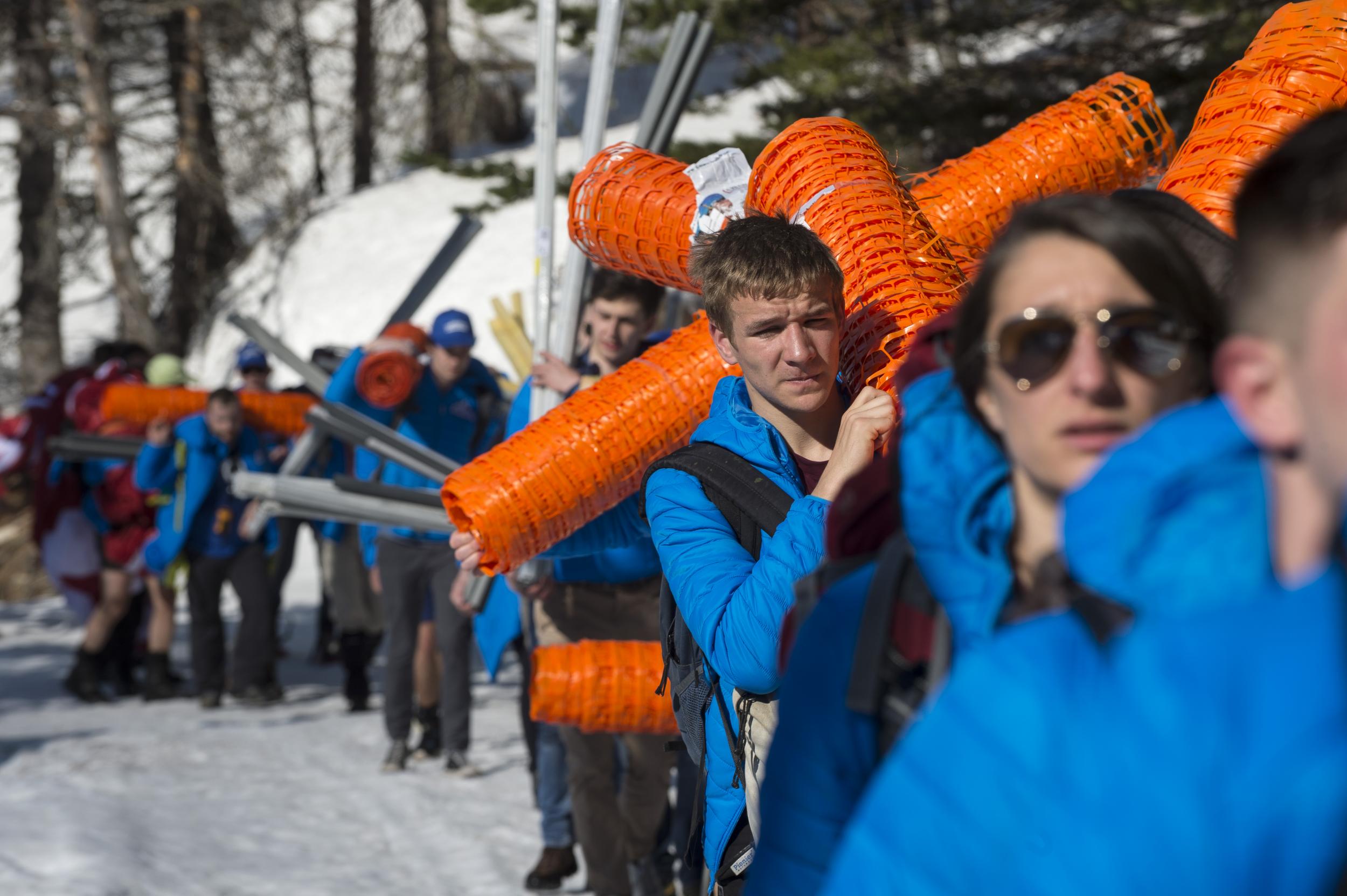 &#13;
Activists carry supplies during the stunt, titled "Mission Alpes" &#13;