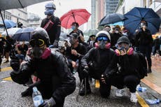 Hong Kong police arrest high-profile activists ahead of banned march