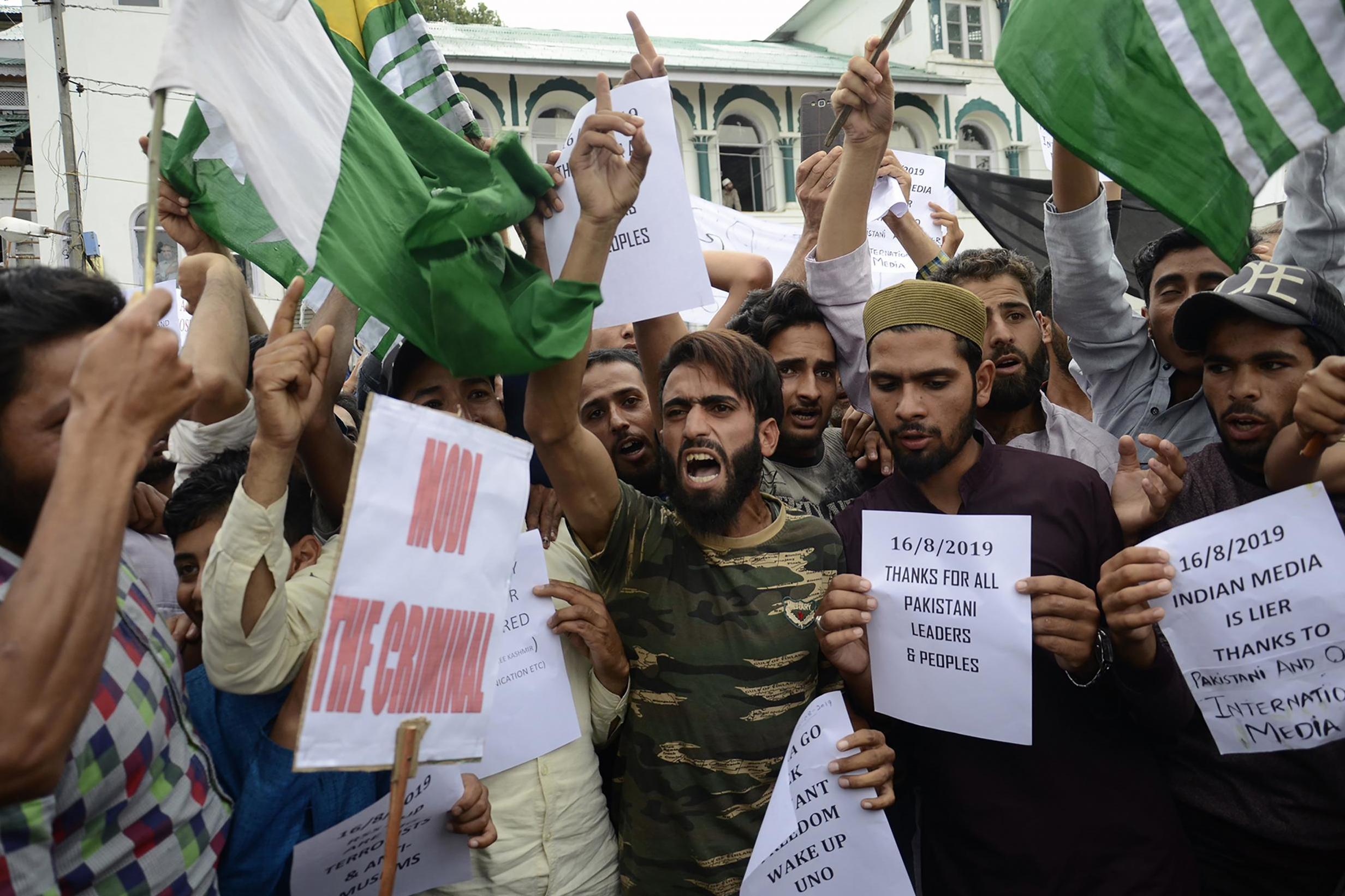 Protesters at a rally against the Indian government's move to strip Jammu and Kashmir of its autonomy (AFP/Getty)