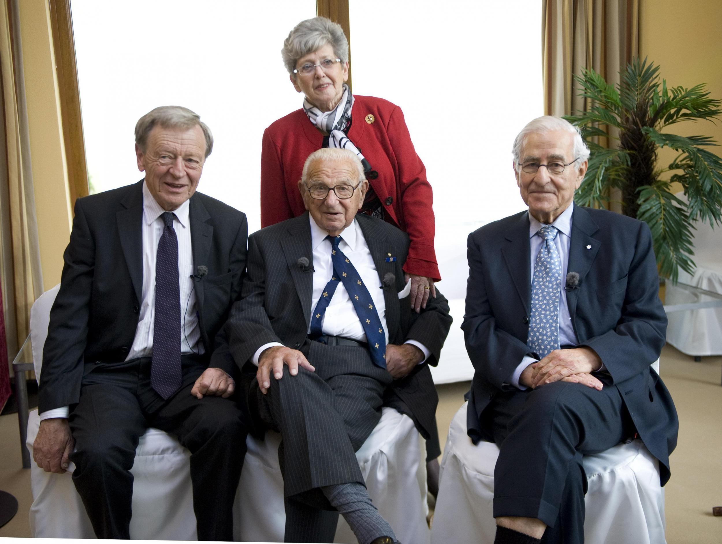 Sir Nicholas Winton (centre) with three children he saved from the Nazi death camps (left to right) Lord Alf Dubs (left), Joe Schlesinger (right) and Lady Grenfell-Baines