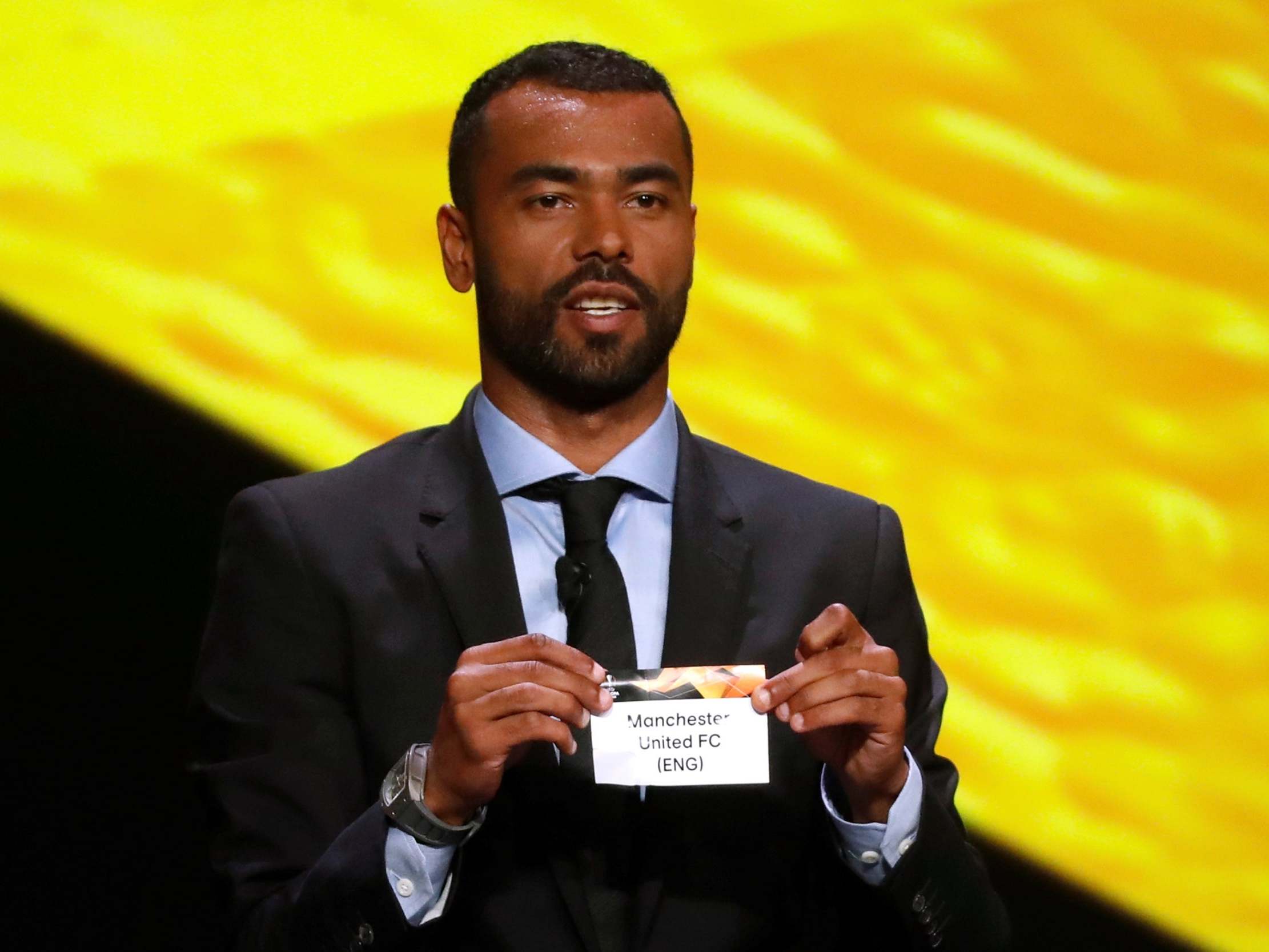Ashley Cole draws Manchester United at the Uefa ceremony in Monaco