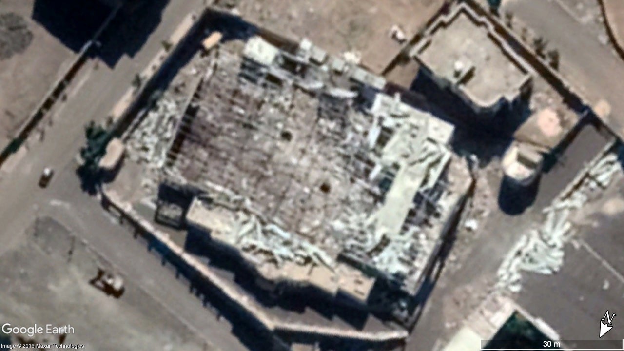 Satellite images of the funeral hall struck by the Saudi-led coalition in October 2016 show two distinct holes in the floor, which researchers say indicate a double-tap strike