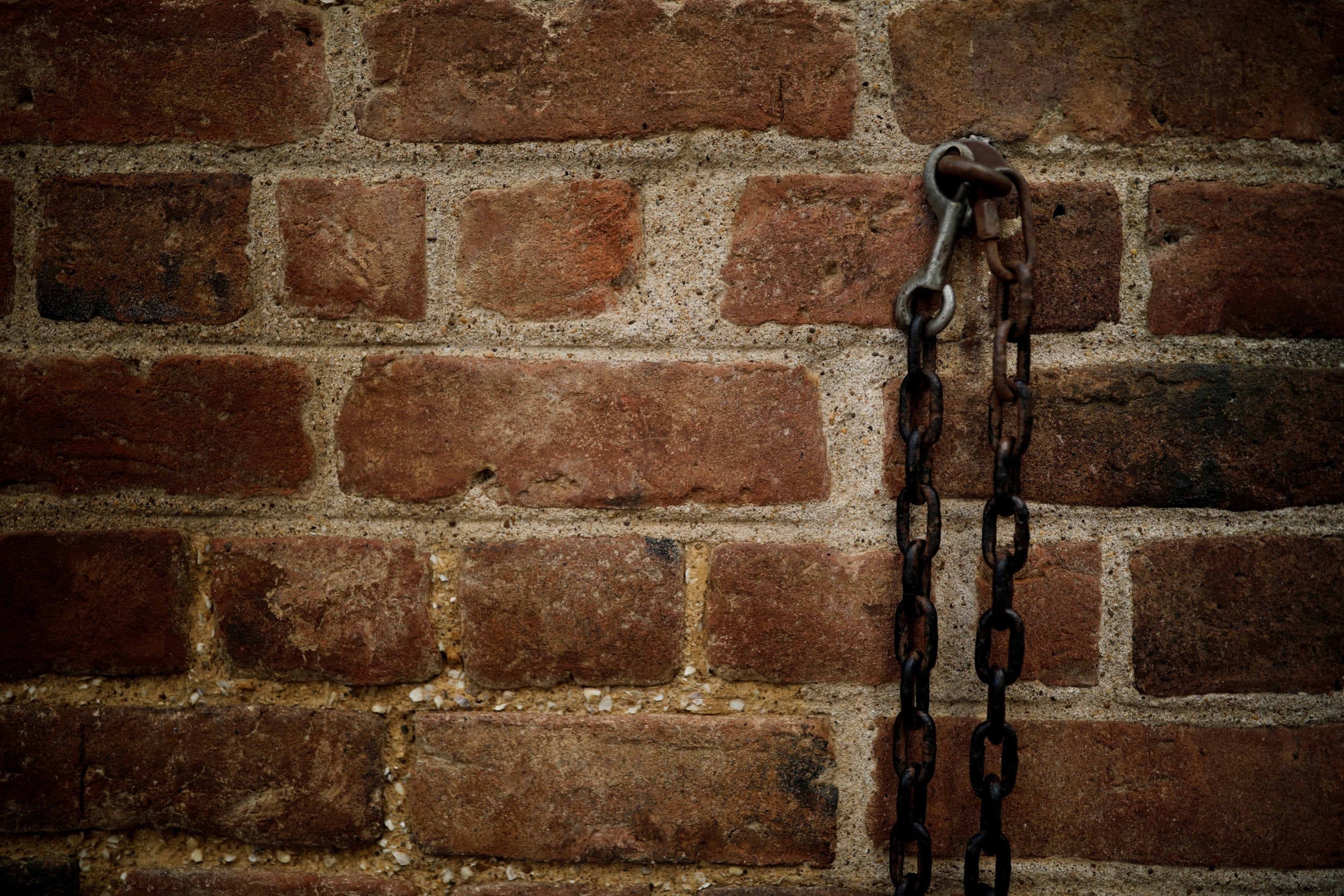 Chains and a lock attached to a wall at Mount Vernon estate, home to George Washington, first president of the United States and a slave owner