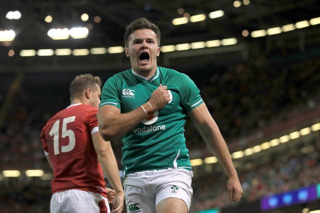 Jacob Stockdale celebrates scoring his first try against Wales
