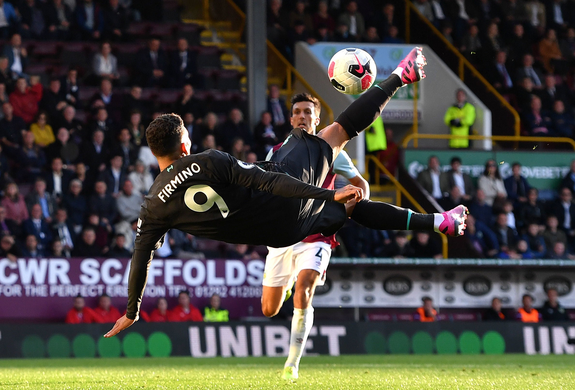 Roberto Firmino tries an acrobatic finish