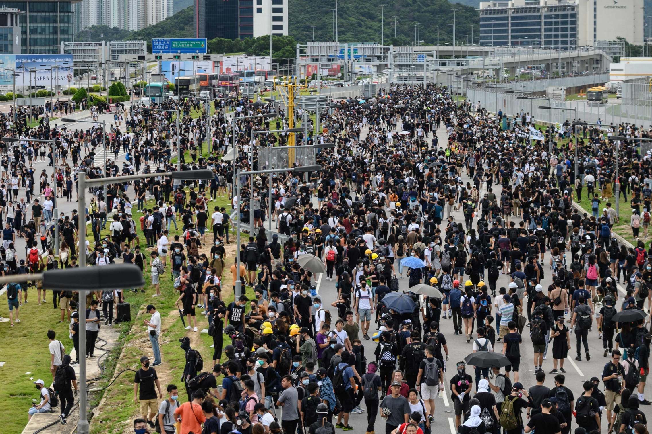 Protesters occupy a road leading to Hong Kong International Airport (AFP/Getty)