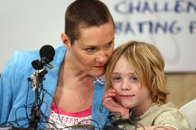 British artist Alison Lapper attends a news conference with her son Parys on April 24, 2006