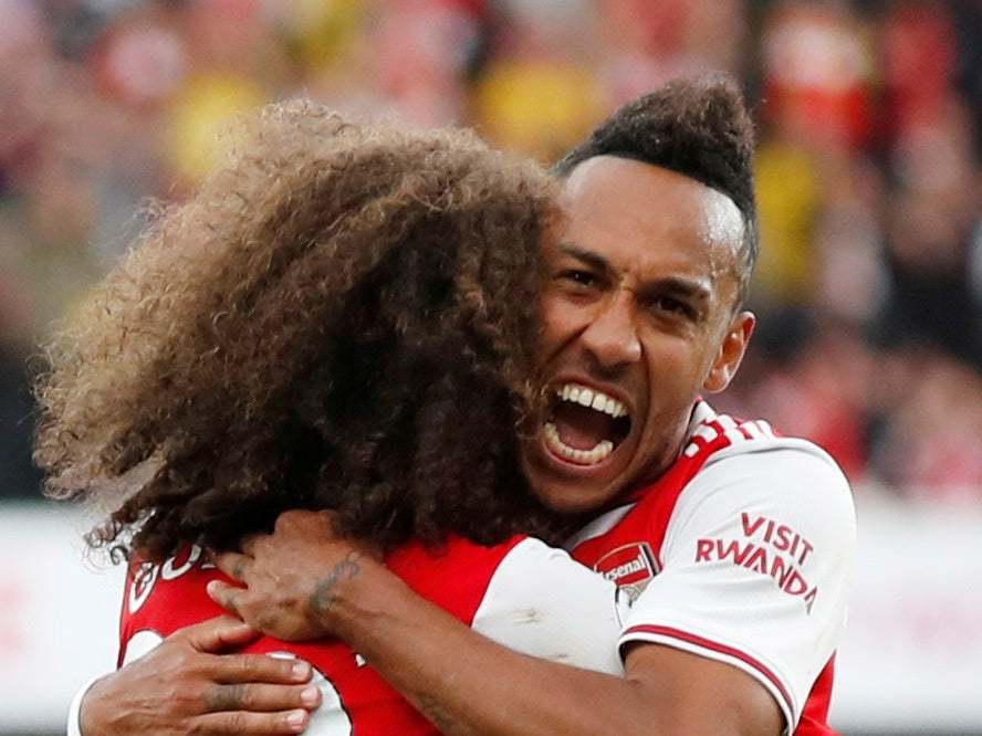 Aubameyang celebrates with Guendouzi (Reuters)