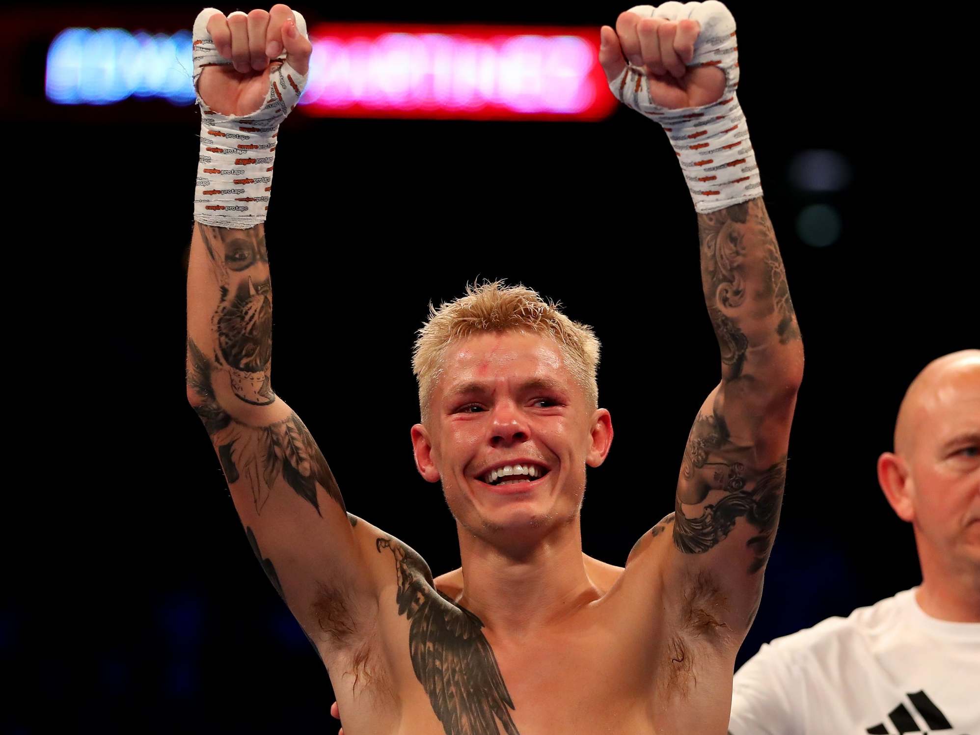 Edwards celebrates after the decision is changed to a no contest