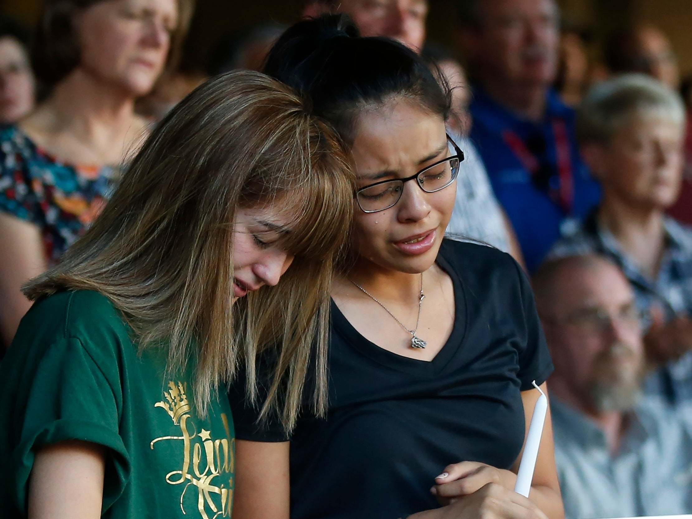 Friends of a high school student among the seven killed in a Texas mass shooting gathered to mourn