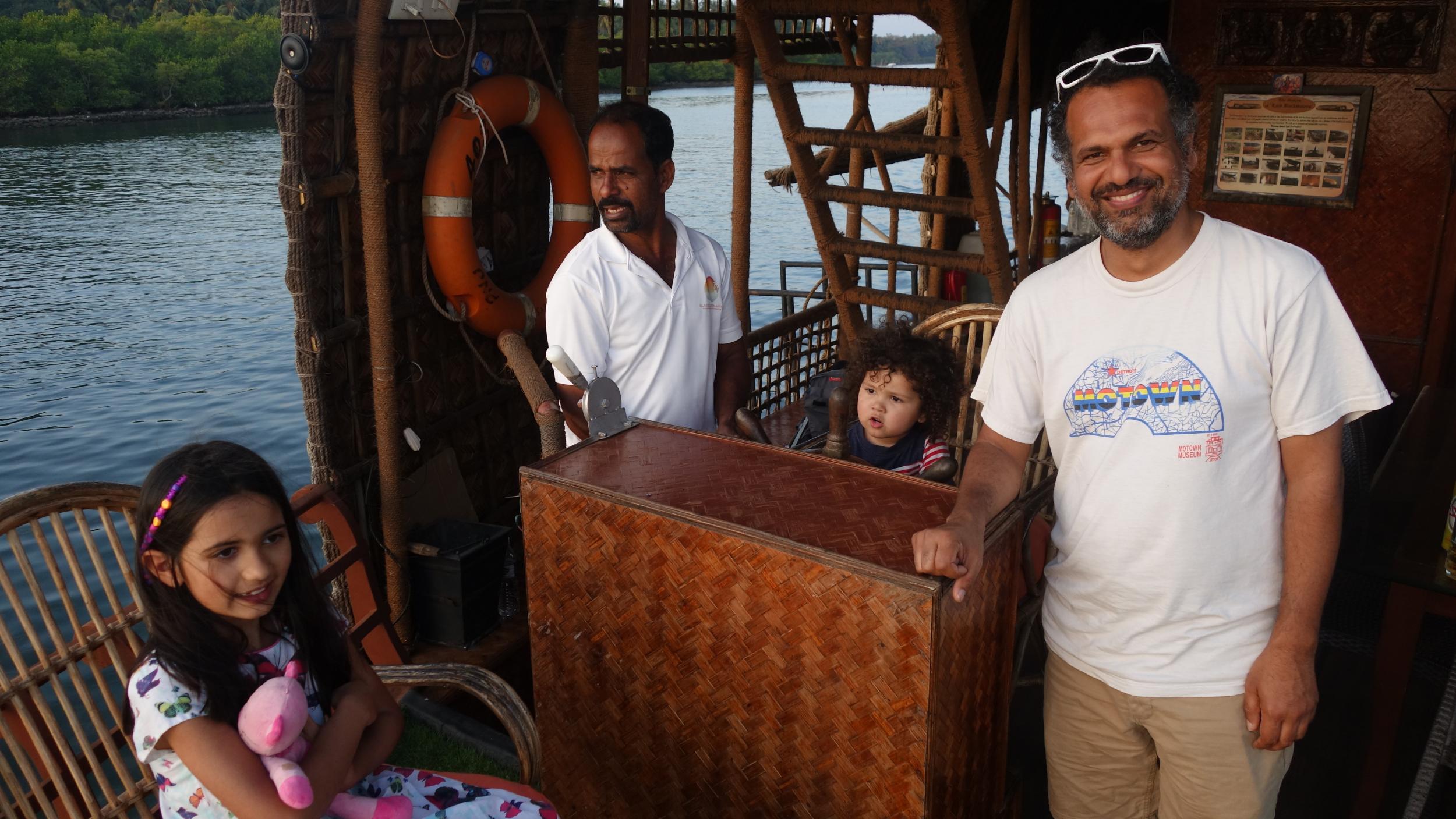 Sarfraz and his family on the houseboat