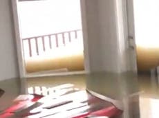 Bahamas minister films video of water halfway up windows