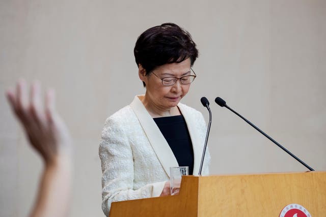 Carrie Lam attends a press conference at the government offices in Hong Kong on Tuesday