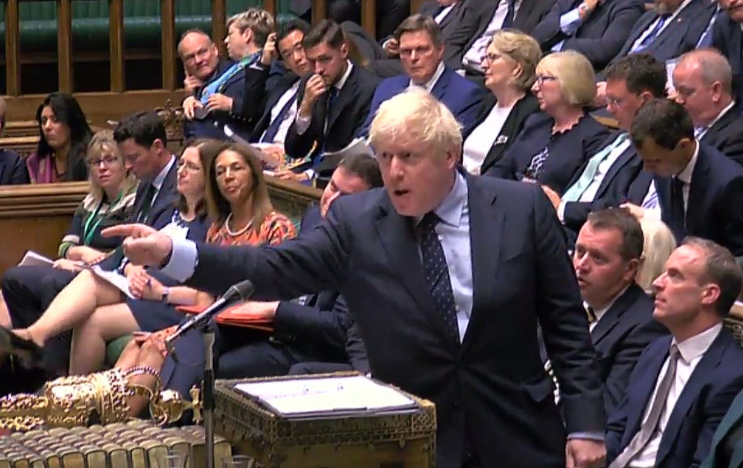 Boris Johnson gestures at the opposition during Prime Minister's Questions in the House of Commons