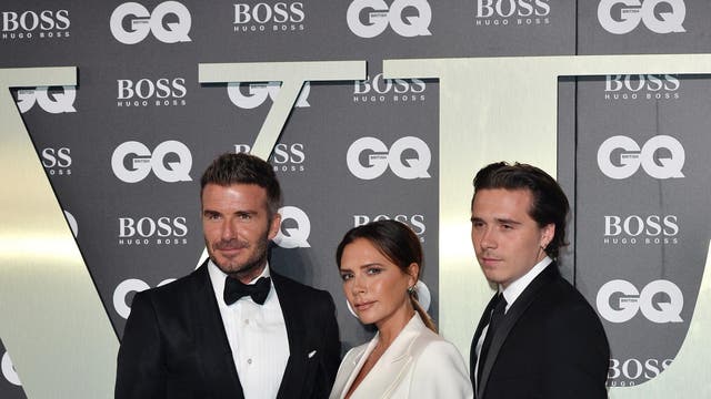 The Beckhams know how to have a fashionable family night out. David, who was honoured with a special award on the night by <i>GQ</i> editor Dylan Jones, chose a classic black tuxedo, a style that was also sported by his son. Victoria went for tailoring too, though hers came in the form of a loose-fitting double-breasted suit in an ivory shade.