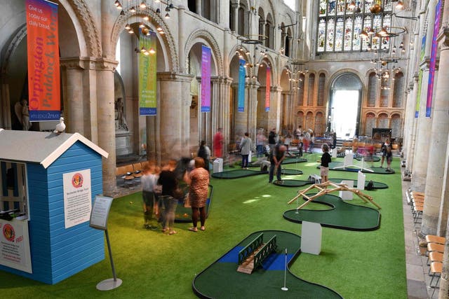 Rochester Cathedral installed a miniature golf course in its nave to improve visitor numbers this summer