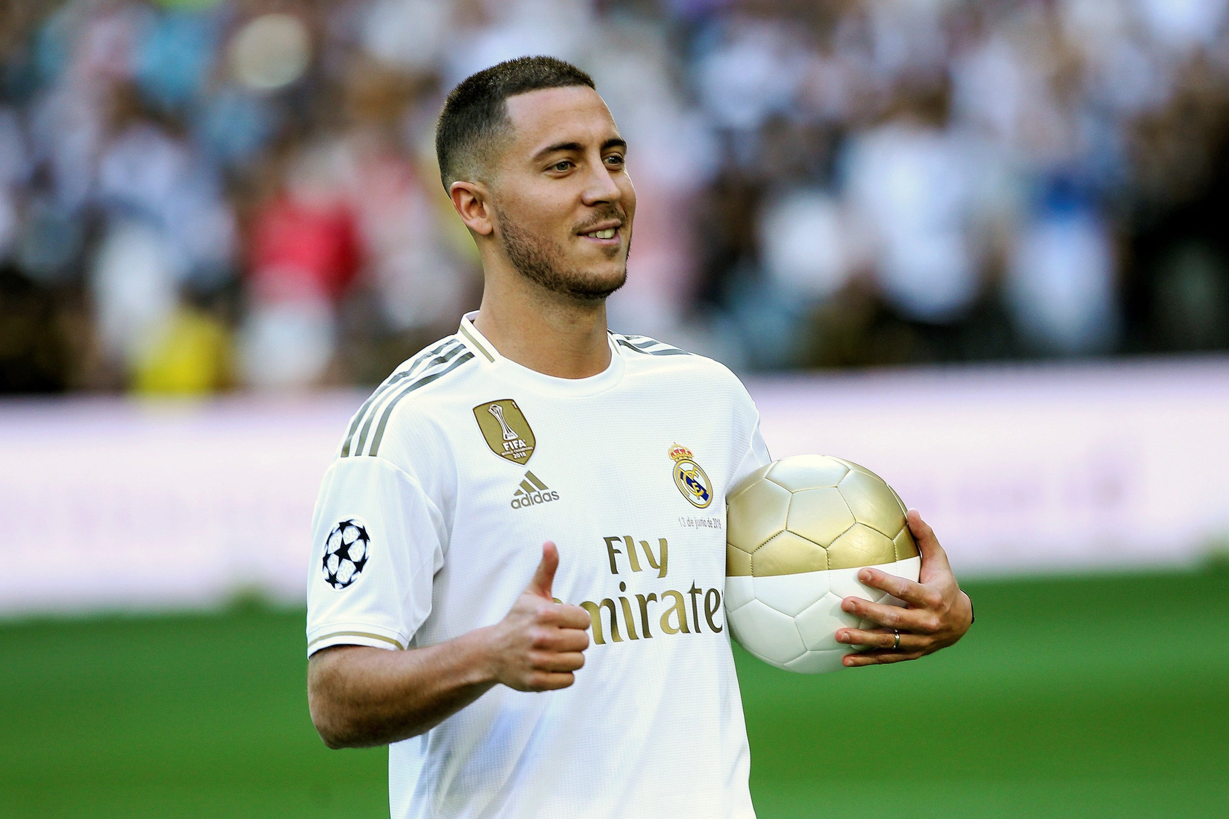 Eden Hazard poses at his Real Madrid unveiling