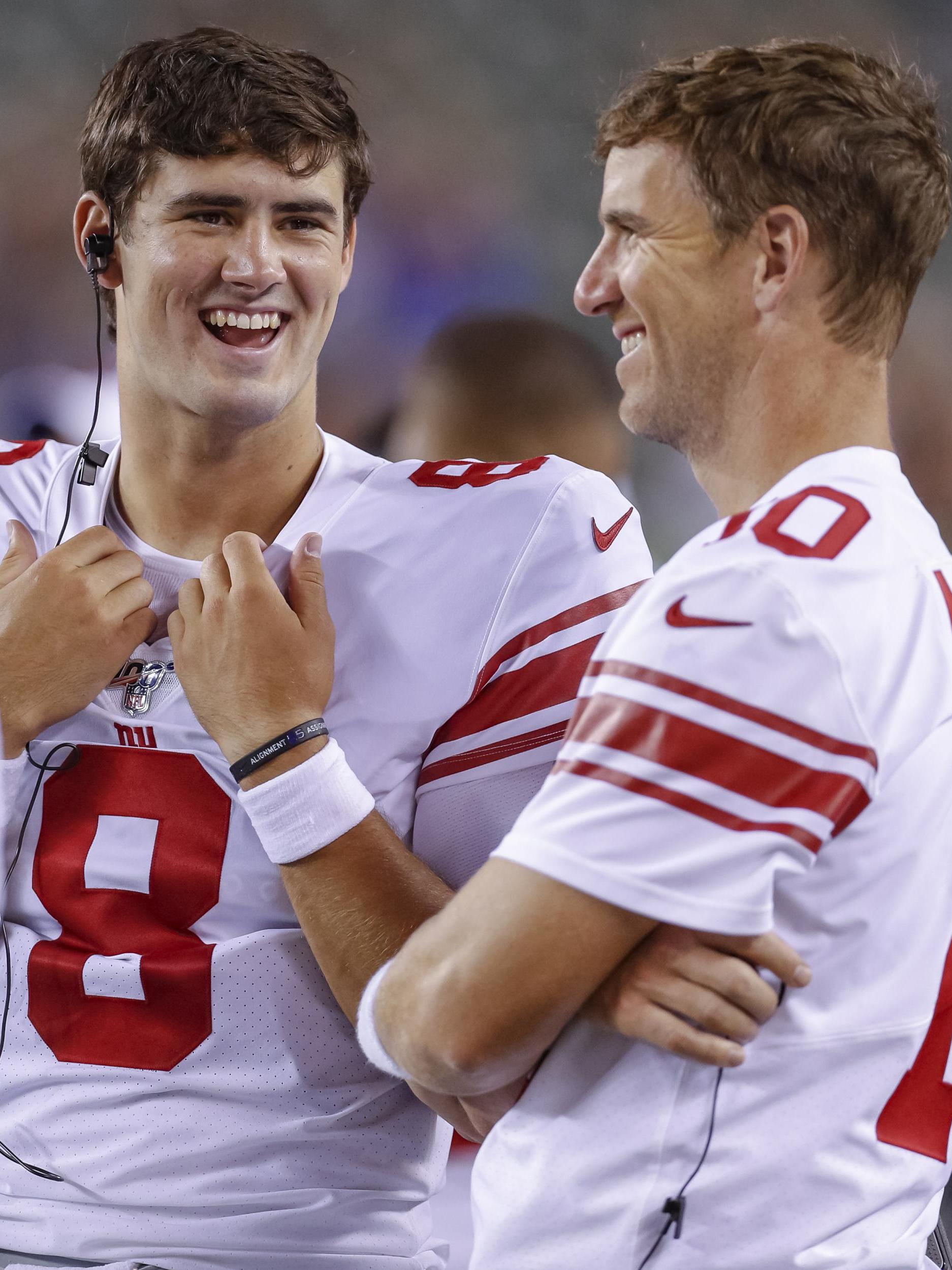 Jones and Manning share a joke