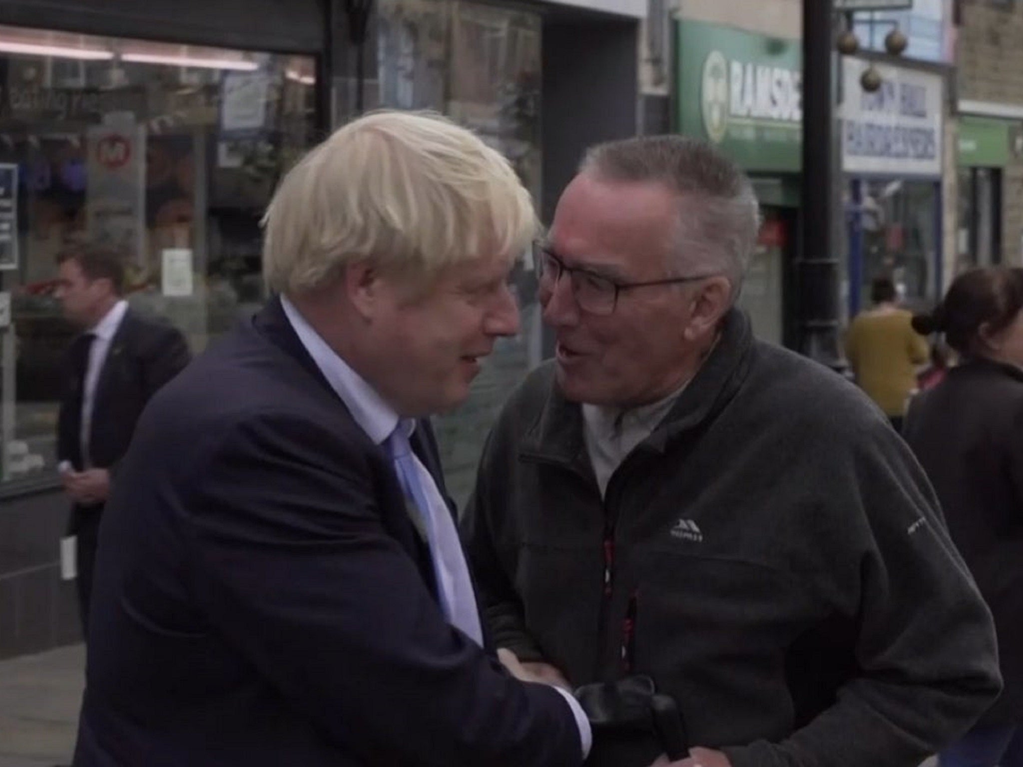 A man asked Boris Johnson to "please leave my down" as the prime minister visited Morley, in Yorkshire, 5 September 2019.