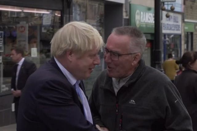 A man asked Boris Johnson to "please leave my down" as the prime minister visited Morley, in Yorkshire, 5 September 2019.