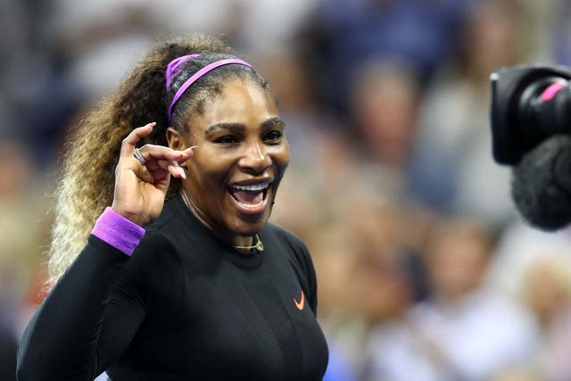 Serena Williams waves to the camera after reaching the final
