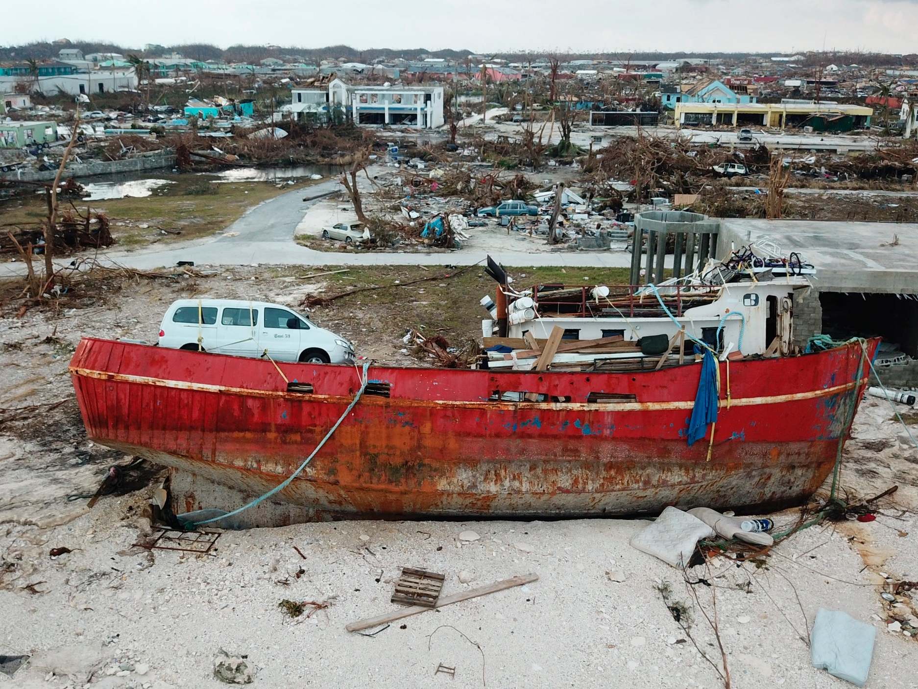 A boat sits grounded in the aftermath of Hurricane Dorian, in Marsh Harbor, Abaco Island, Bahamas, on 6 September 2019