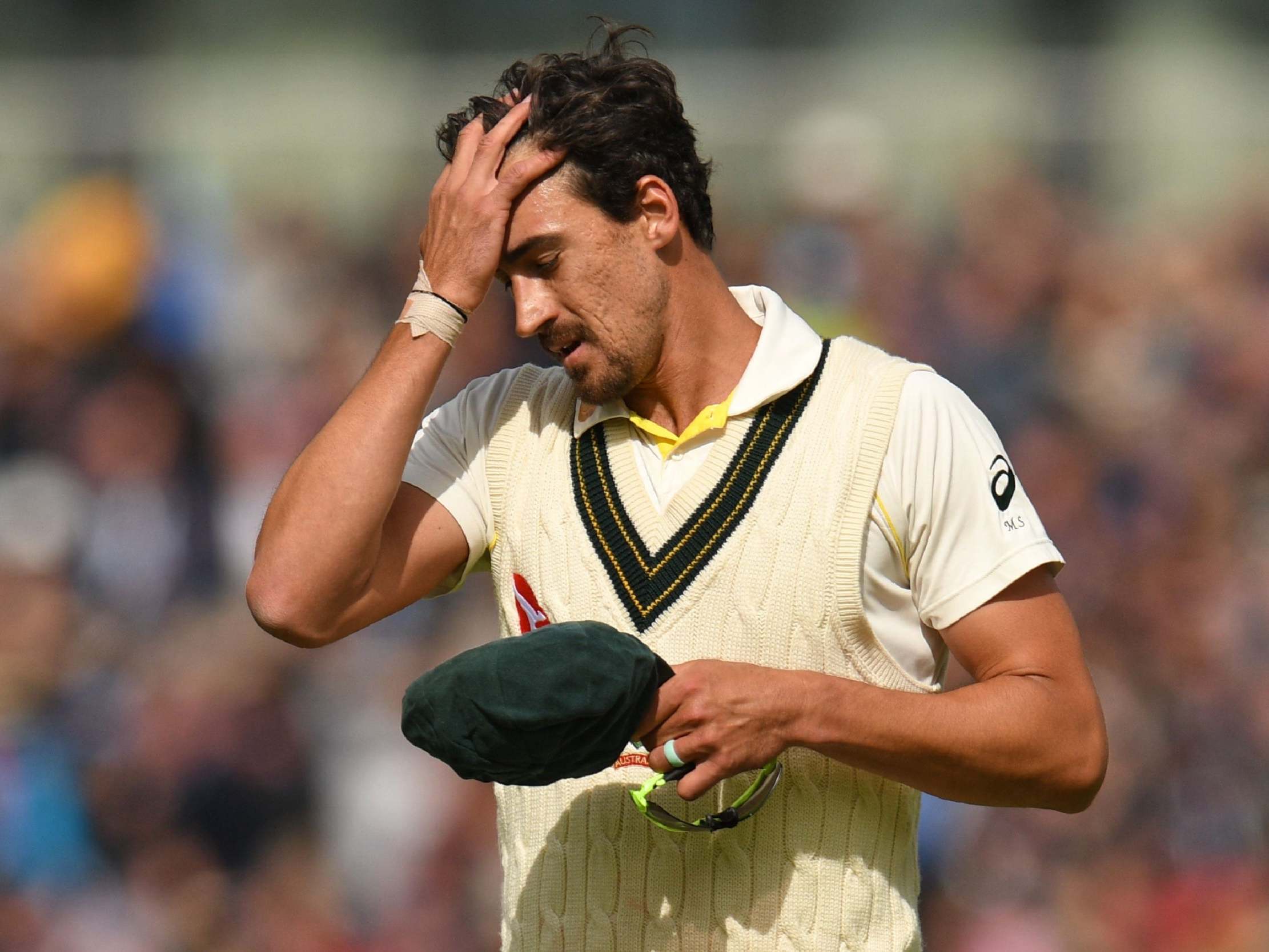 Australia's Mitchell Starc gestures during play