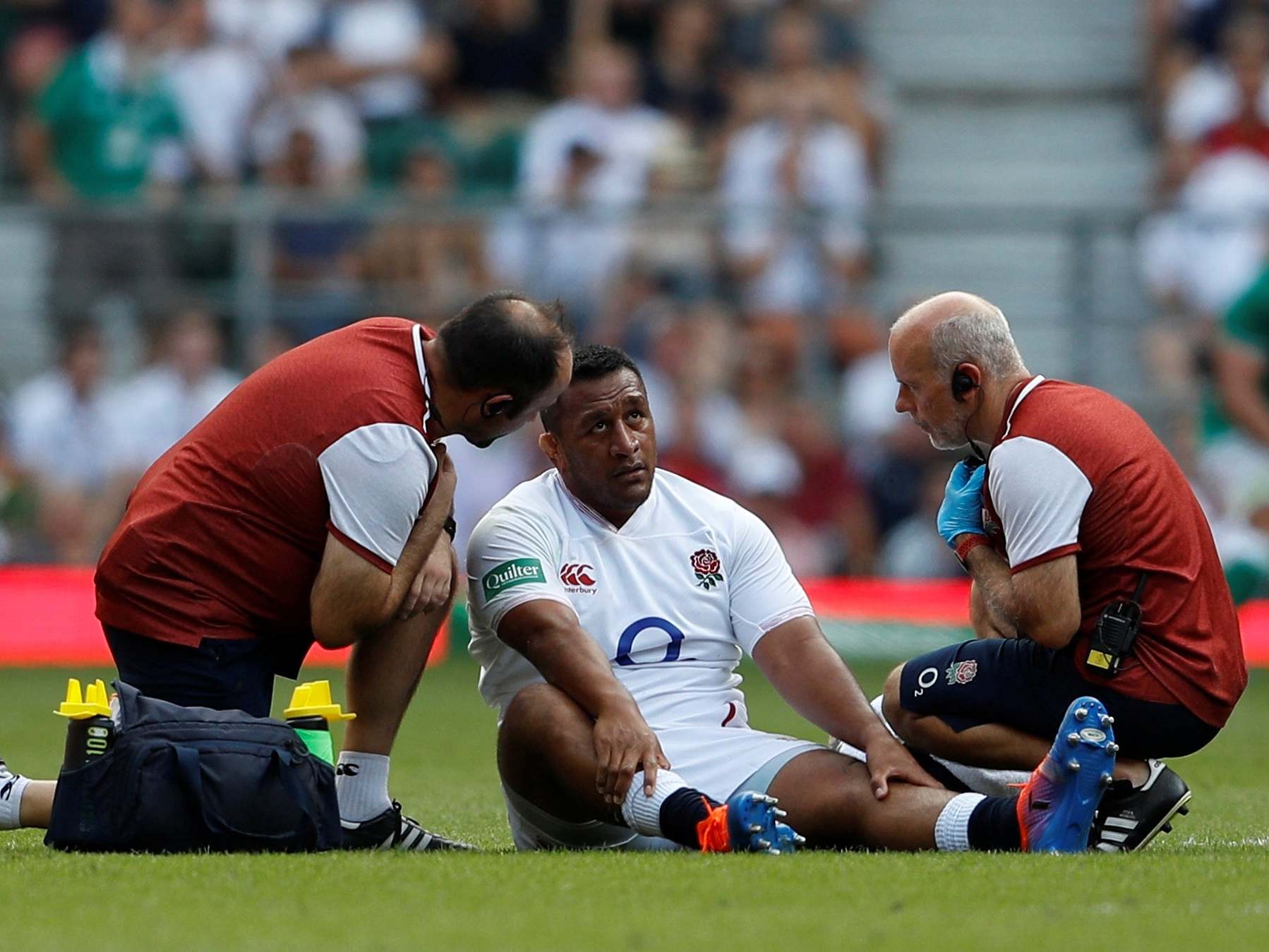 England's Mako Vunipola receives medical treatment