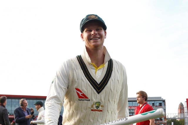 Steve Smith celebrates at Old Trafford after Australia retain the Ashes