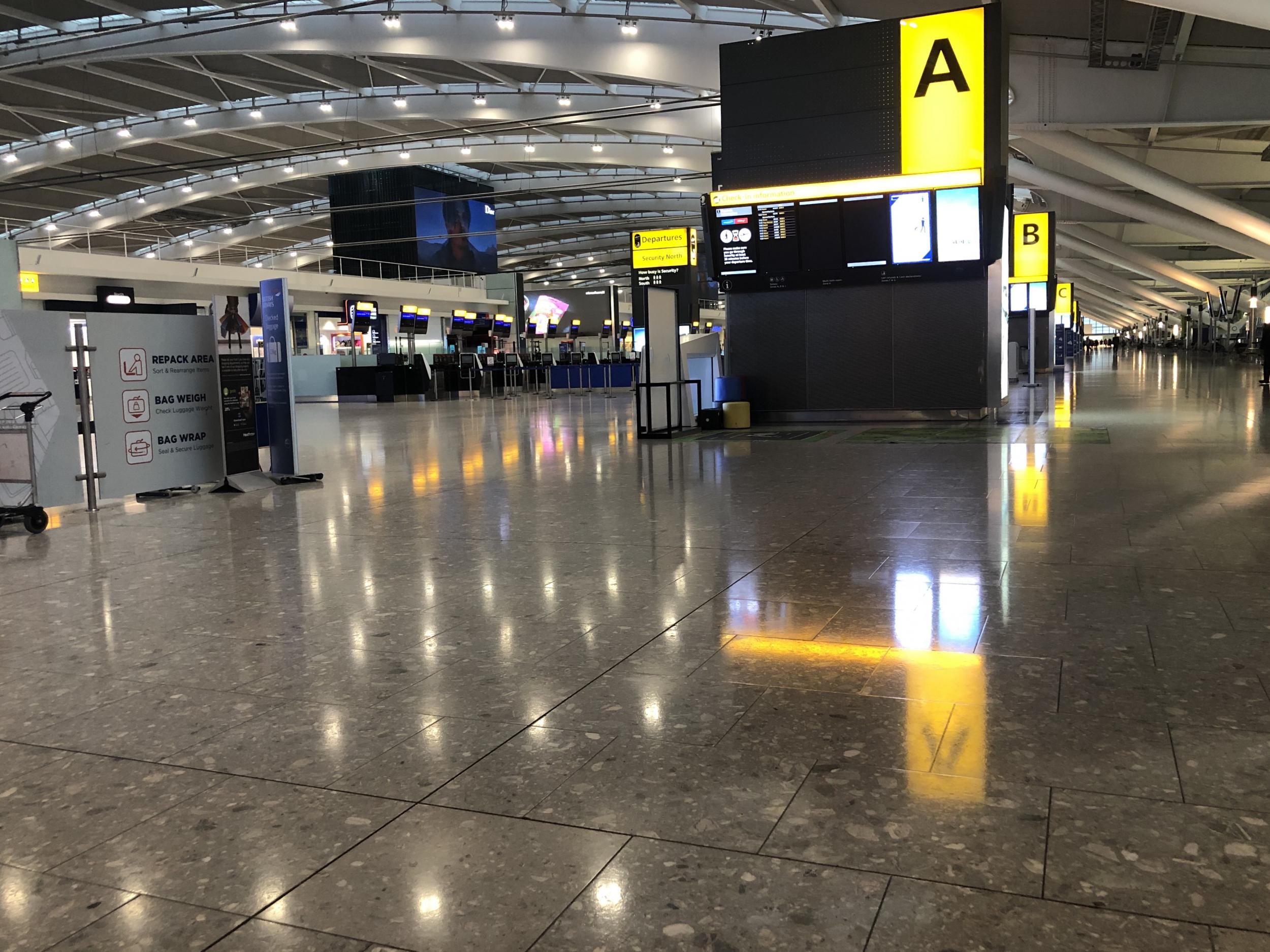 An unusually empty Heathrow Terminal 5 this morning: passengers whose flights have been cancelled have been advised to avoid the airport