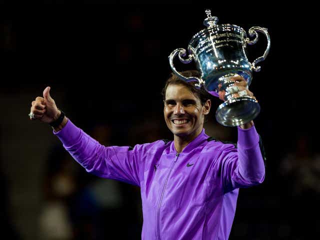 Rafael Nadal celebrates with the US Open men's singles trophy